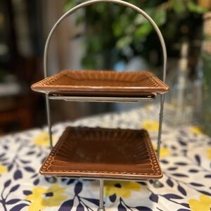 Two tiered real home “Let us entertain you” collection. Brown plates